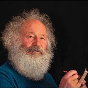 Len writing a note by Roy Fidler