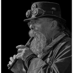 Playing a tune for the Morris men by Roy Fidler