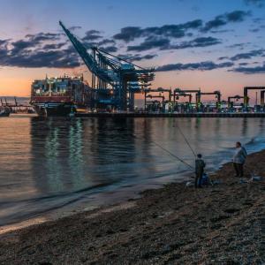 2024 3rd place Fishing in the shadows of giants by Rob Gray